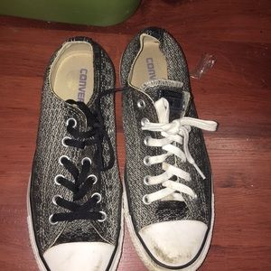 Black, grey, and brown converse .